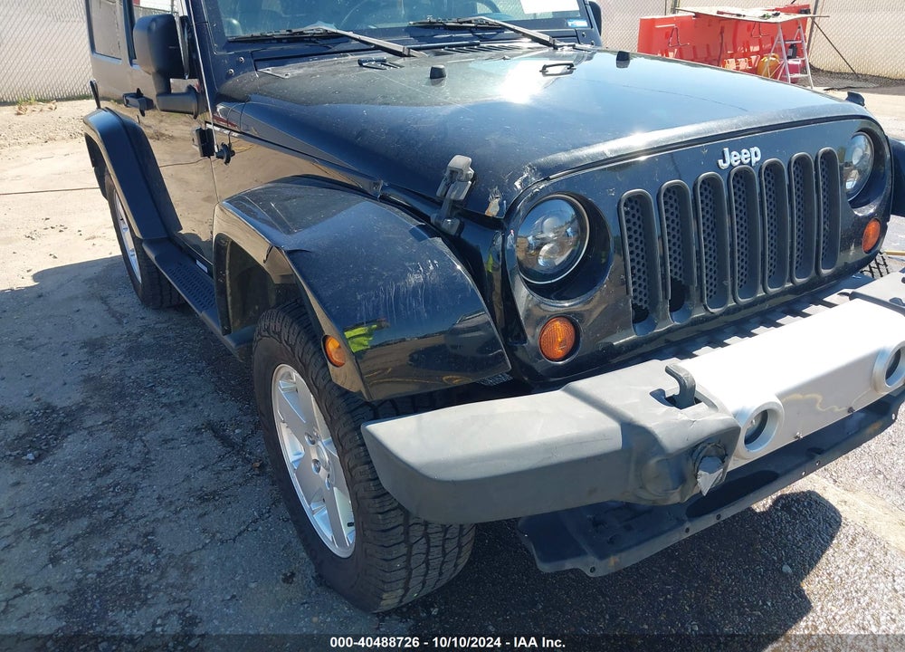 2010 JEEP WRANGLER SAHARA VIN: 1J4GA5D1XAL216217