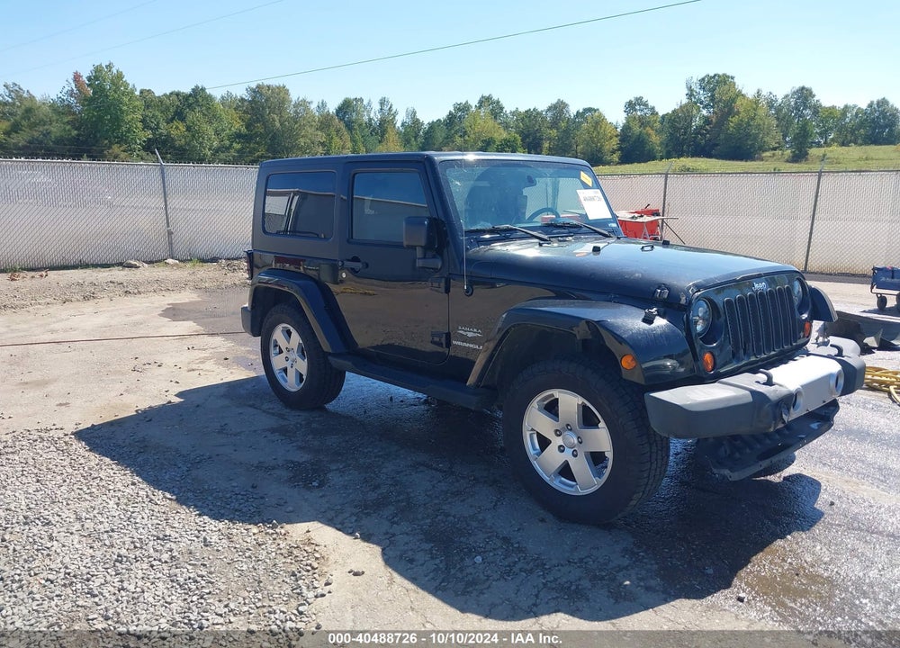 2010 JEEP WRANGLER SAHARA VIN: 1J4GA5D1XAL216217