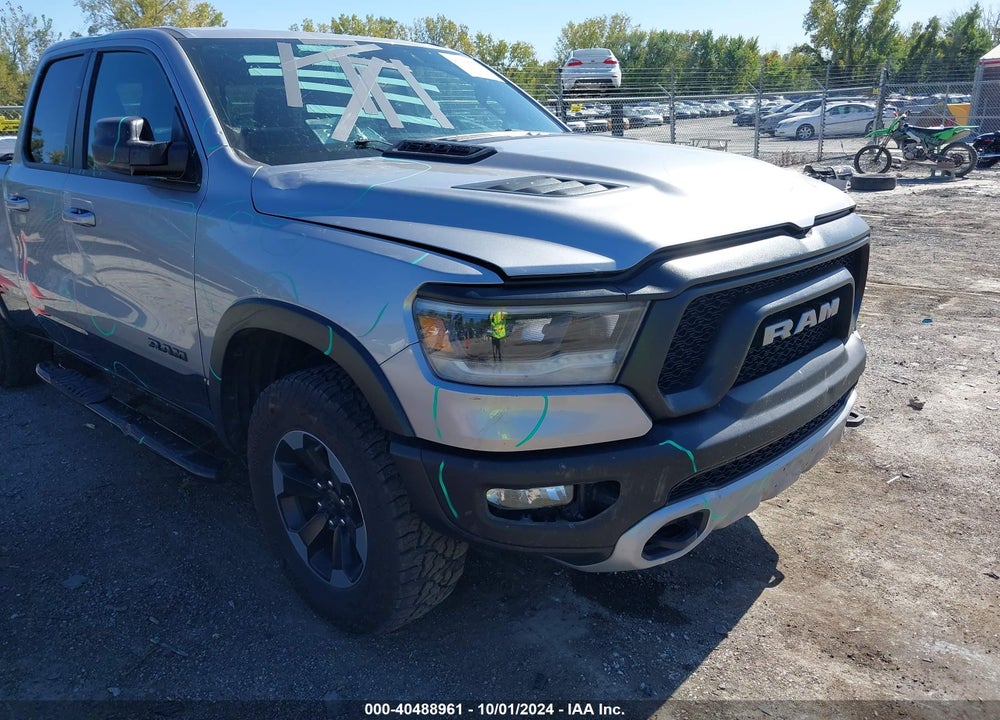 2019 RAM 1500 REBEL QUAD CAB 4X4 6'4 BOX VIN: 1C6SRFET8KN848564