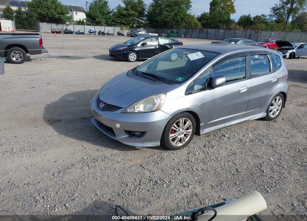 2009 HONDA FIT SPORT VIN: JHMGE88409S001798