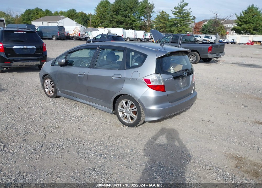 2009 HONDA FIT SPORT VIN: JHMGE88409S001798