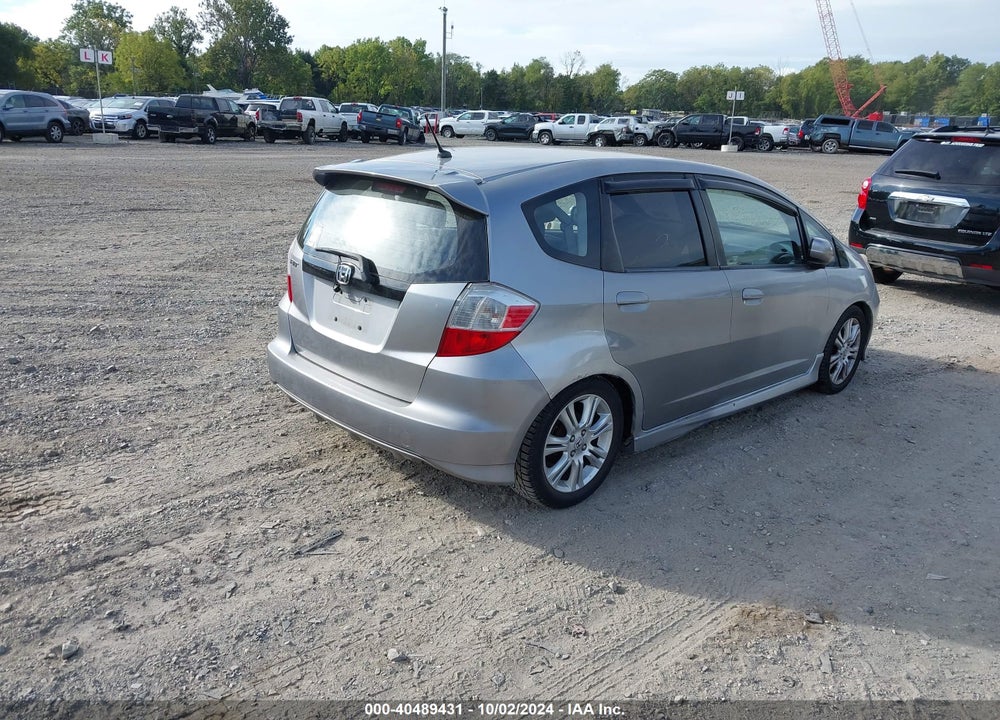 2009 HONDA FIT SPORT VIN: JHMGE88409S001798