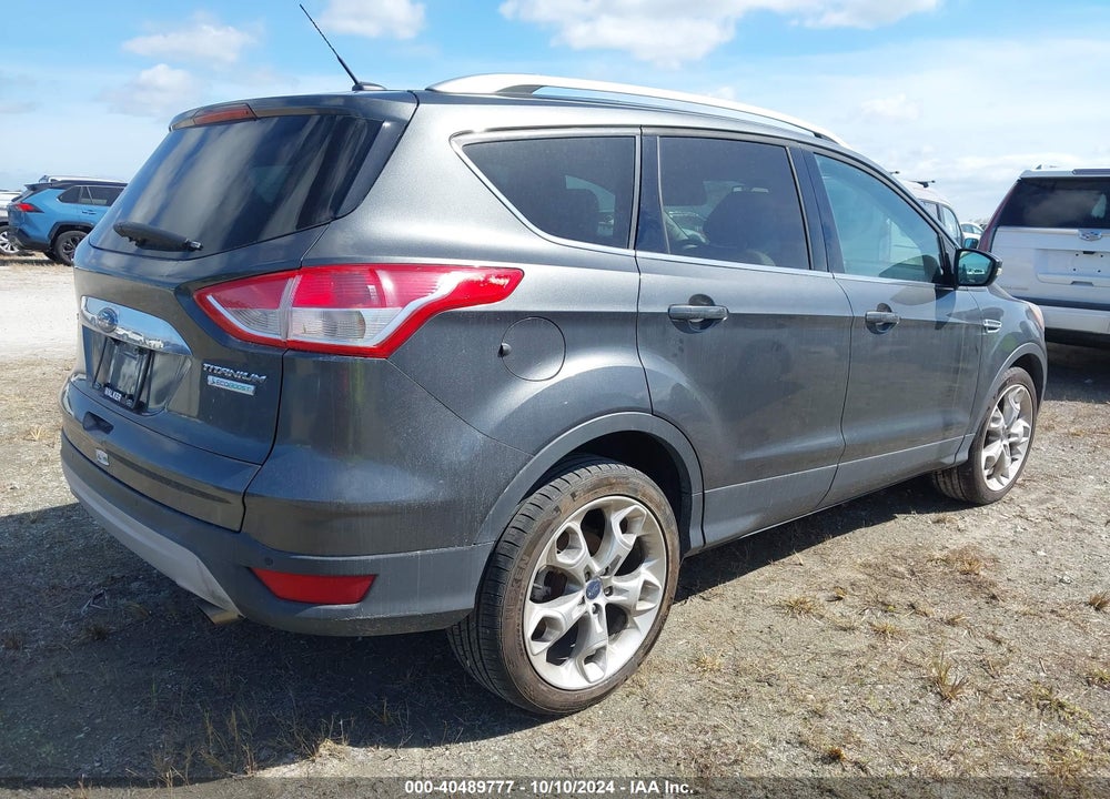 2016 FORD ESCAPE TITANIUM VIN: 1FMCU0JX9GUB43945