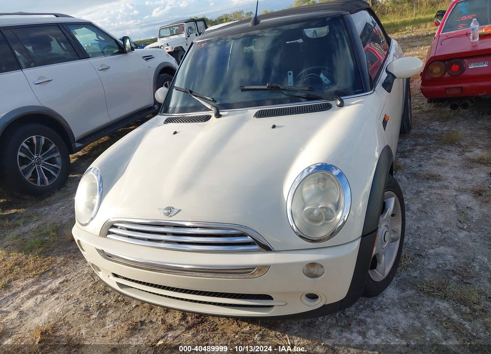 2006 MINI COOPER VIN: WMWRF33586TG14493