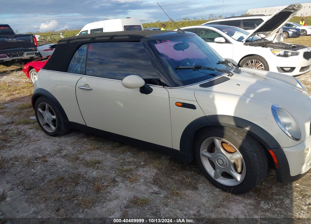2006 MINI COOPER VIN: WMWRF33586TG14493