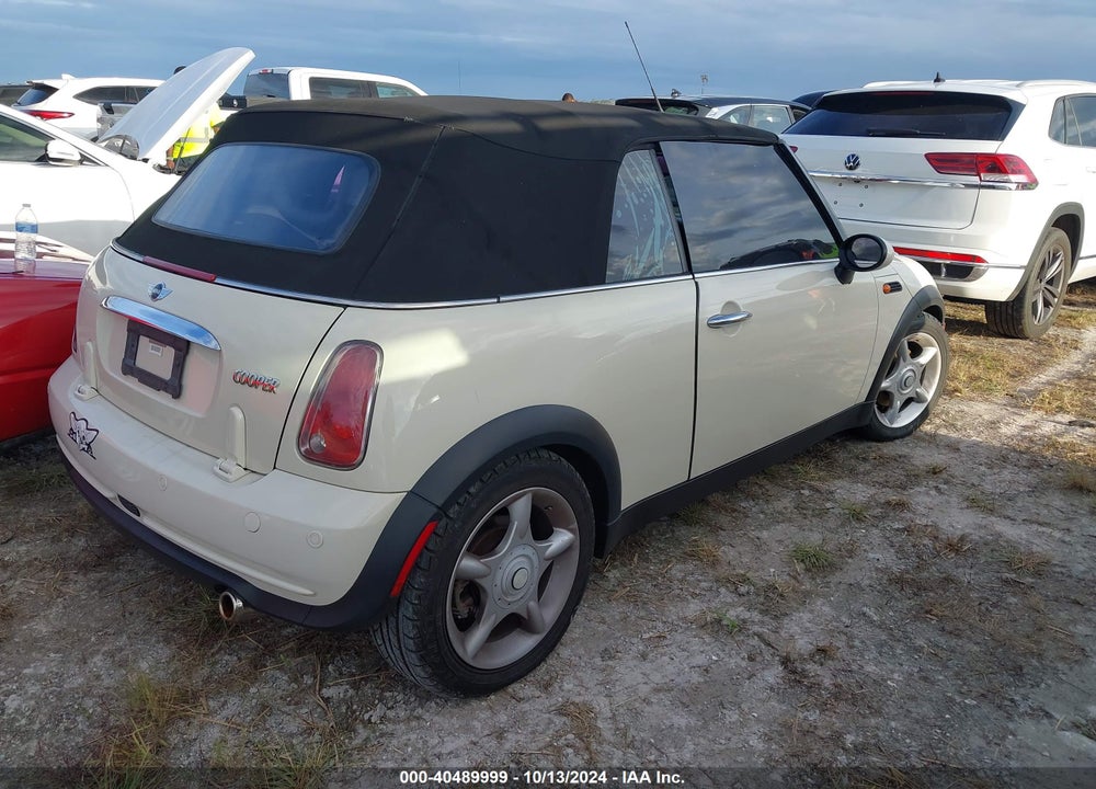 2006 MINI COOPER VIN: WMWRF33586TG14493