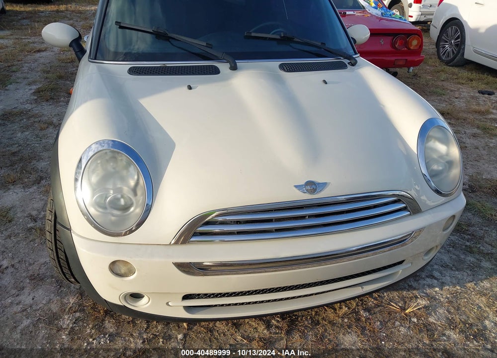 2006 MINI COOPER VIN: WMWRF33586TG14493