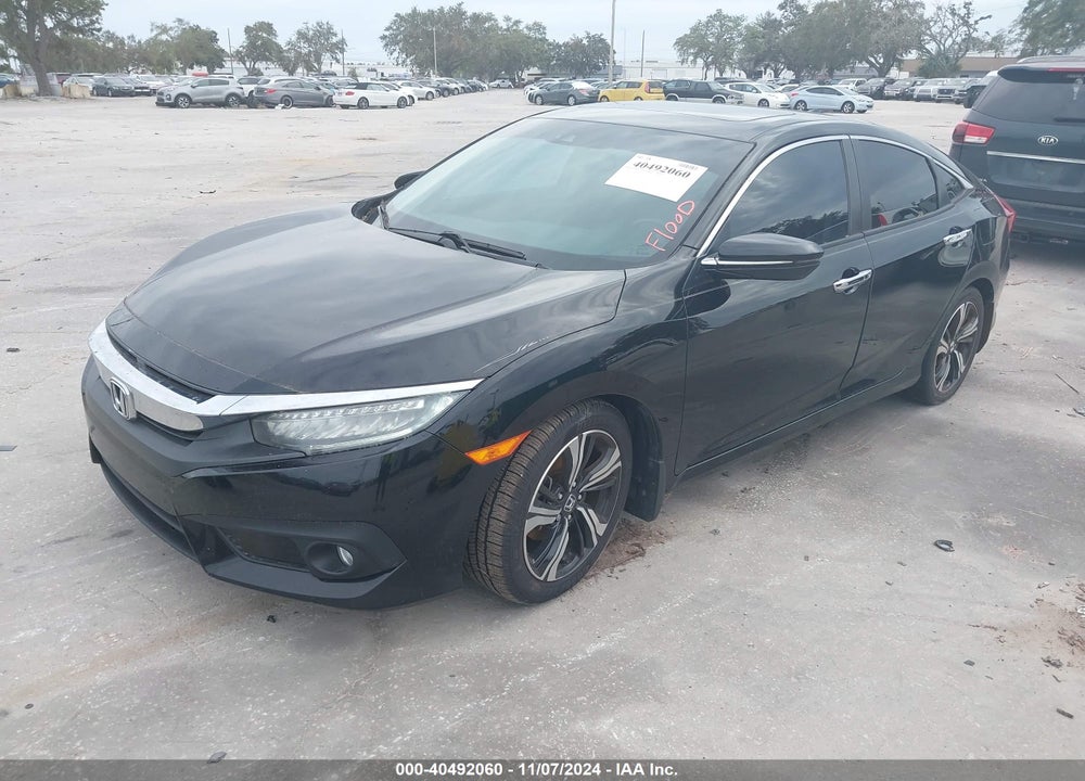 2016 HONDA CIVIC TOURING VIN: 19XFC1F94GE024445
