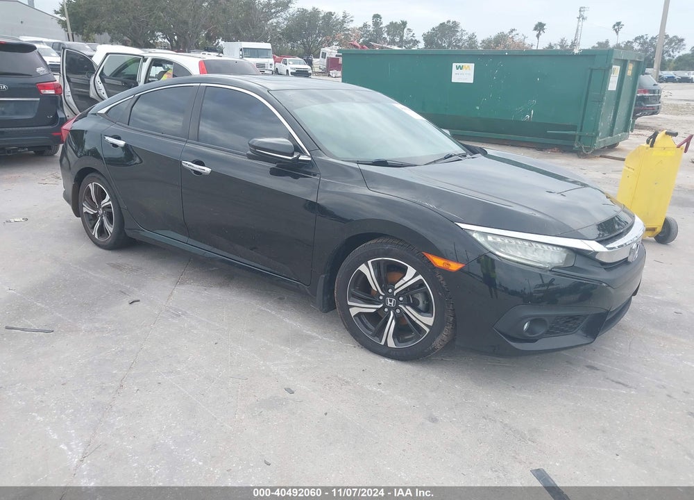 2016 HONDA CIVIC TOURING VIN: 19XFC1F94GE024445