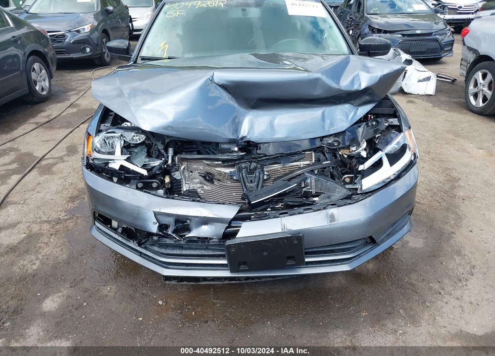 2015 VOLKSWAGEN JETTA 1.8T SE VIN: 3VWD17AJ4FM403657