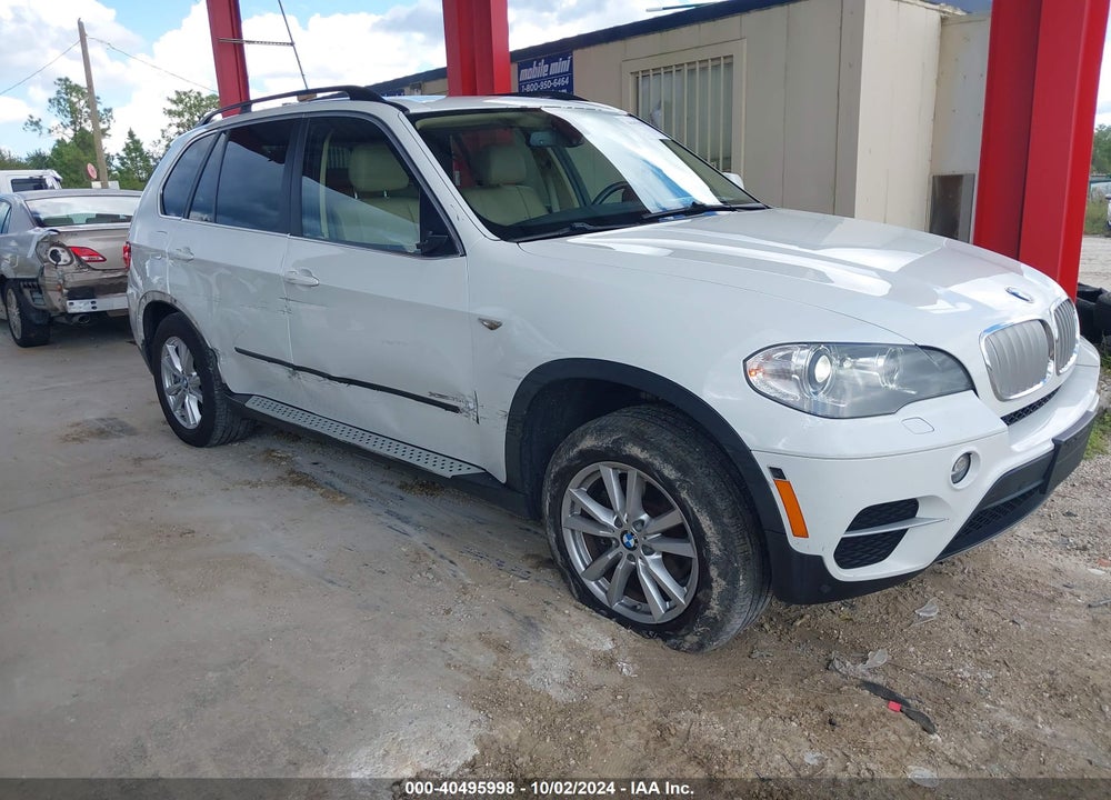 2013 BMW X5 XDRIVE35I/XDRIVE35I PREMIUM/XDRIVE35I SPORT ACTIVITY VIN: 5UXZV4C50D0B10545