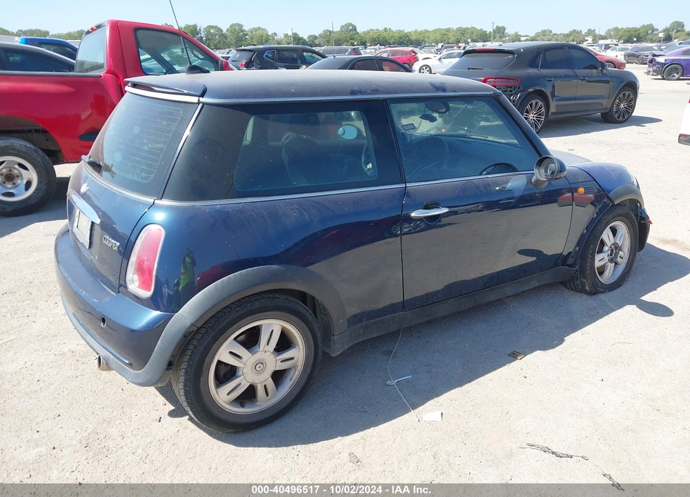2006 MINI COOPER VIN: WMWRC33546TK71204