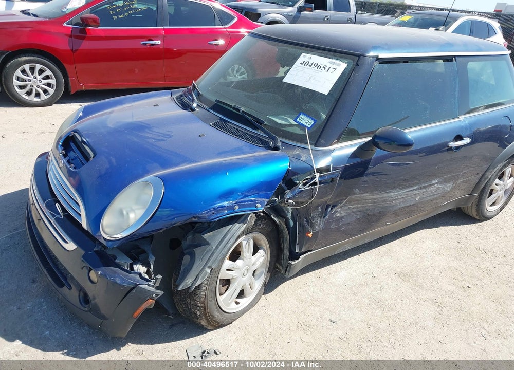 2006 MINI COOPER VIN: WMWRC33546TK71204