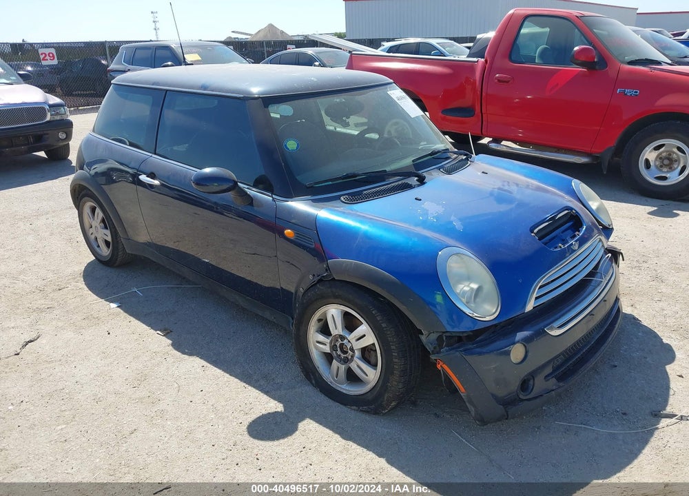 2006 MINI COOPER VIN: WMWRC33546TK71204