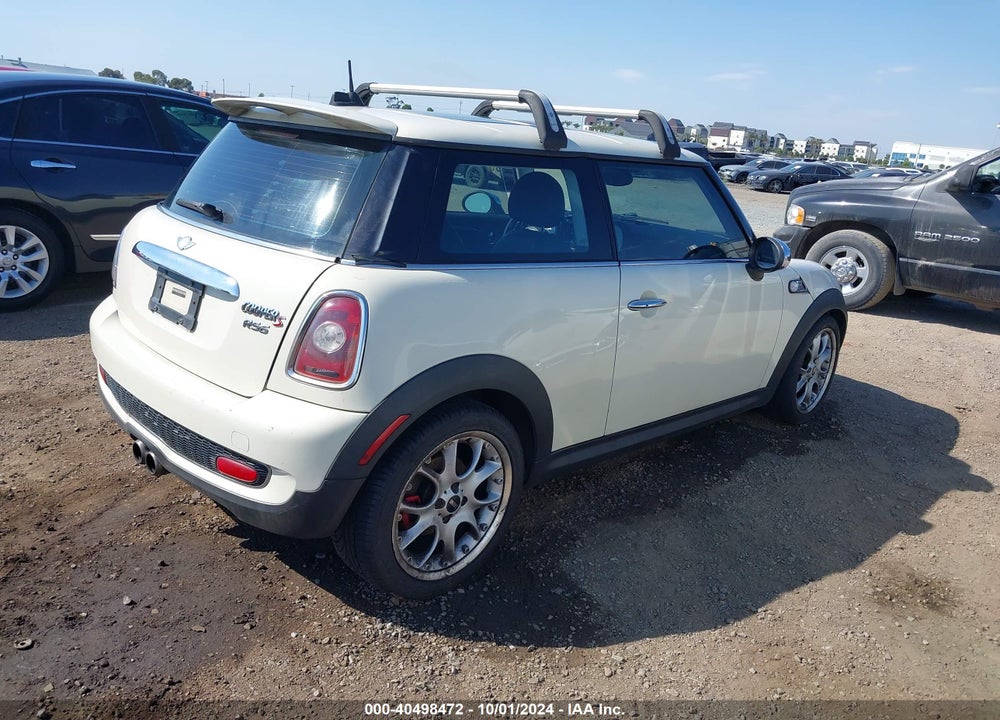 2007 MINI COOPER S VIN: WMWMF73537TL87813
