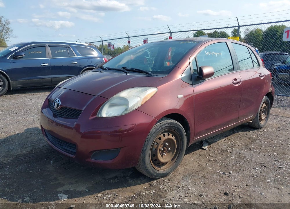 2009 TOYOTA YARIS VIN: JTDKT903195257702