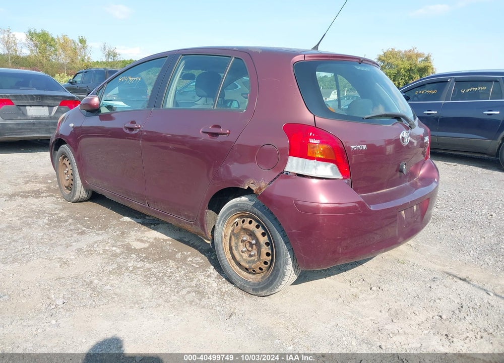2009 TOYOTA YARIS VIN: JTDKT903195257702