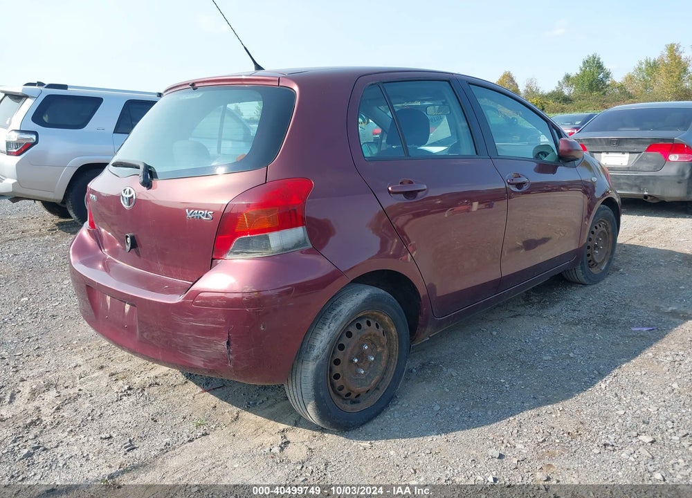 2009 TOYOTA YARIS VIN: JTDKT903195257702