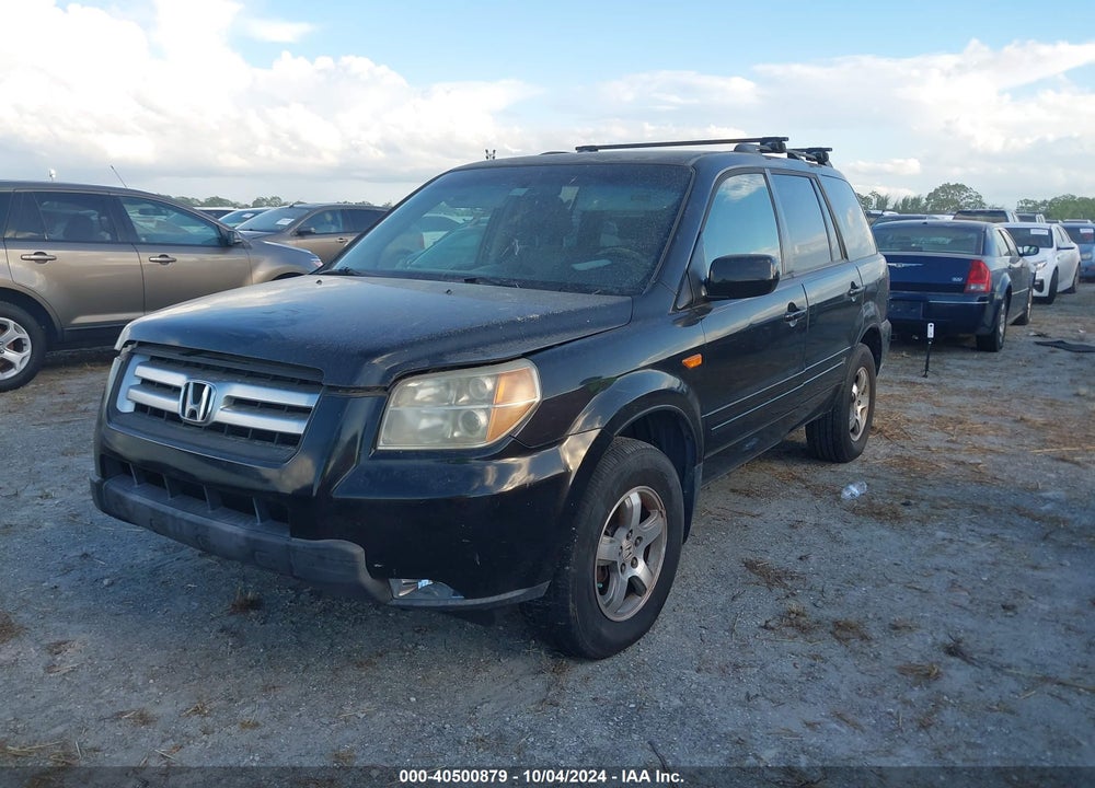 2007 HONDA PILOT EX-L VIN: 5FNYF28787B044712