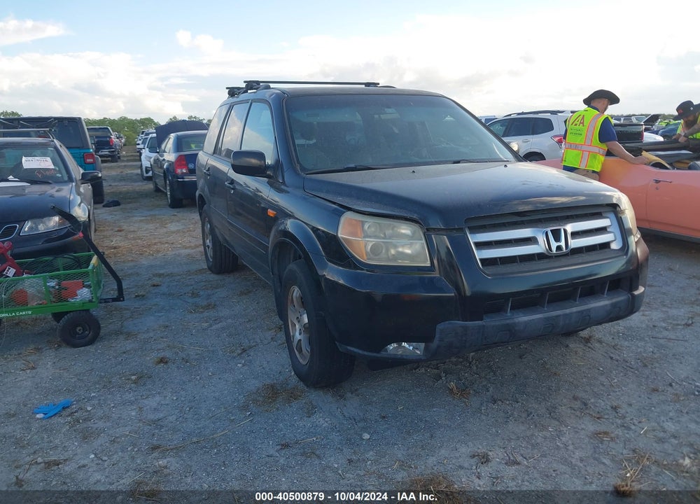2007 HONDA PILOT EX-L VIN: 5FNYF28787B044712
