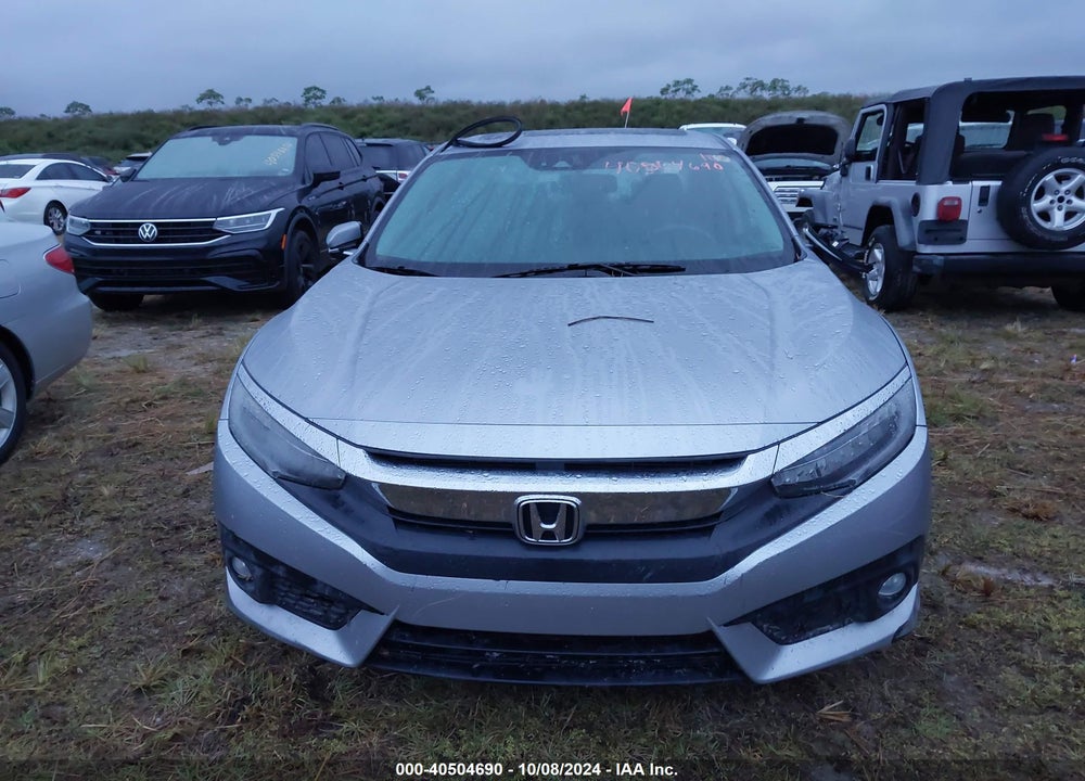 2016 HONDA CIVIC TOURING VIN: 19XFC1F94GE028897