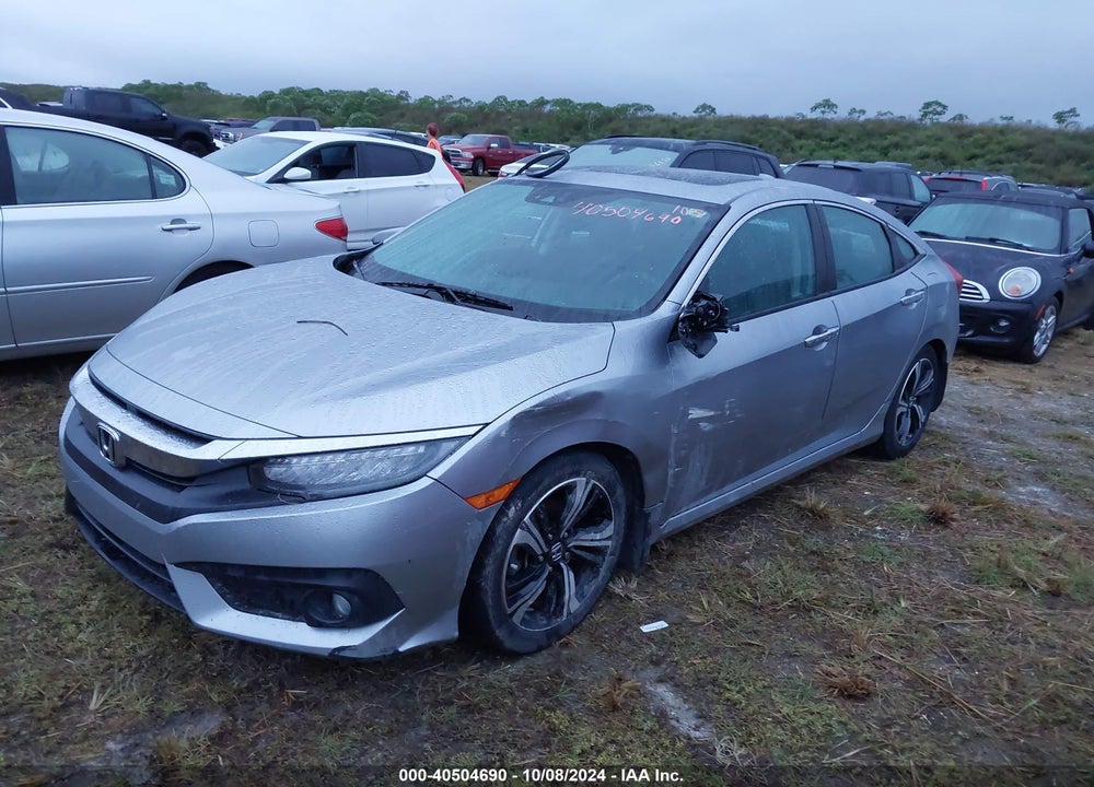 2016 HONDA CIVIC TOURING VIN: 19XFC1F94GE028897