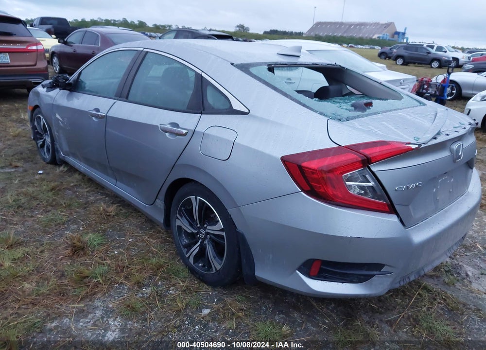 2016 HONDA CIVIC TOURING VIN: 19XFC1F94GE028897