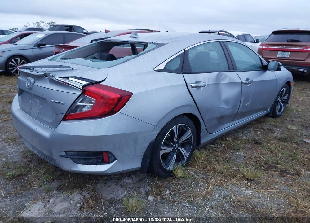 2016 HONDA CIVIC TOURING VIN: 19XFC1F94GE028897