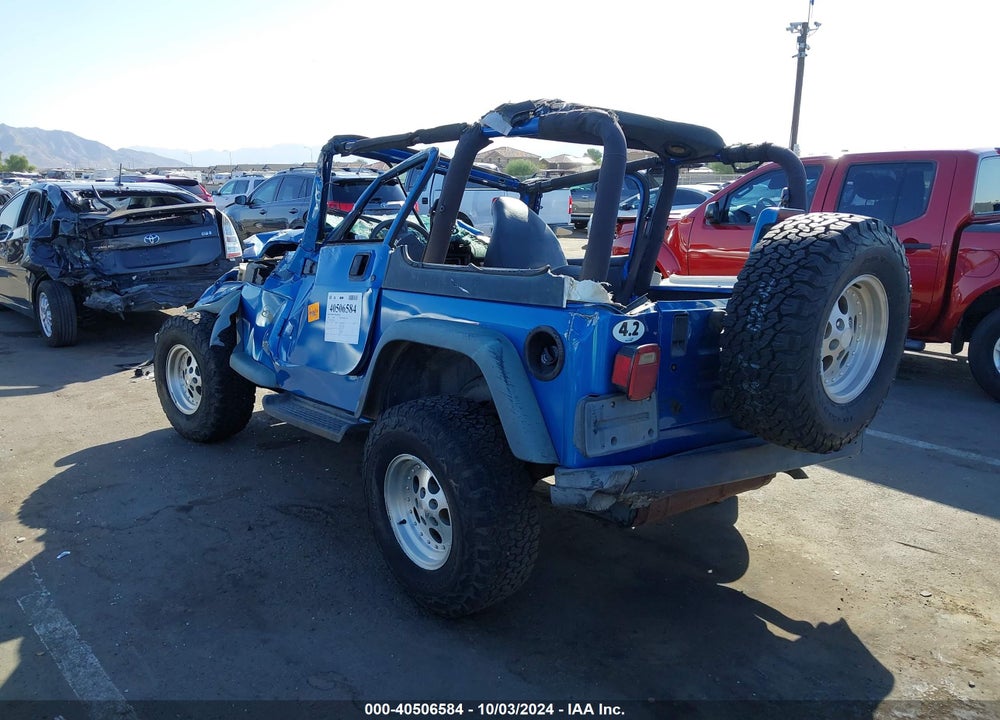 1999 JEEP WRANGLER SPORT VIN: 1J4FY19S2XP433182