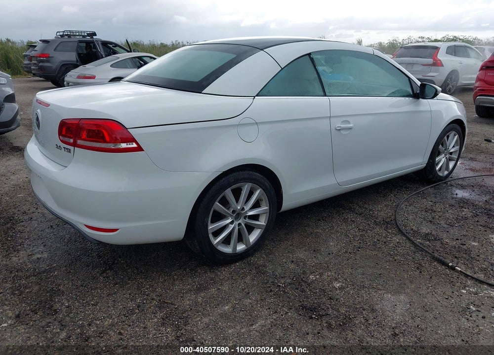 2016 VOLKSWAGEN EOS KOMFORT VIN: WVWBW8AH8GV000884