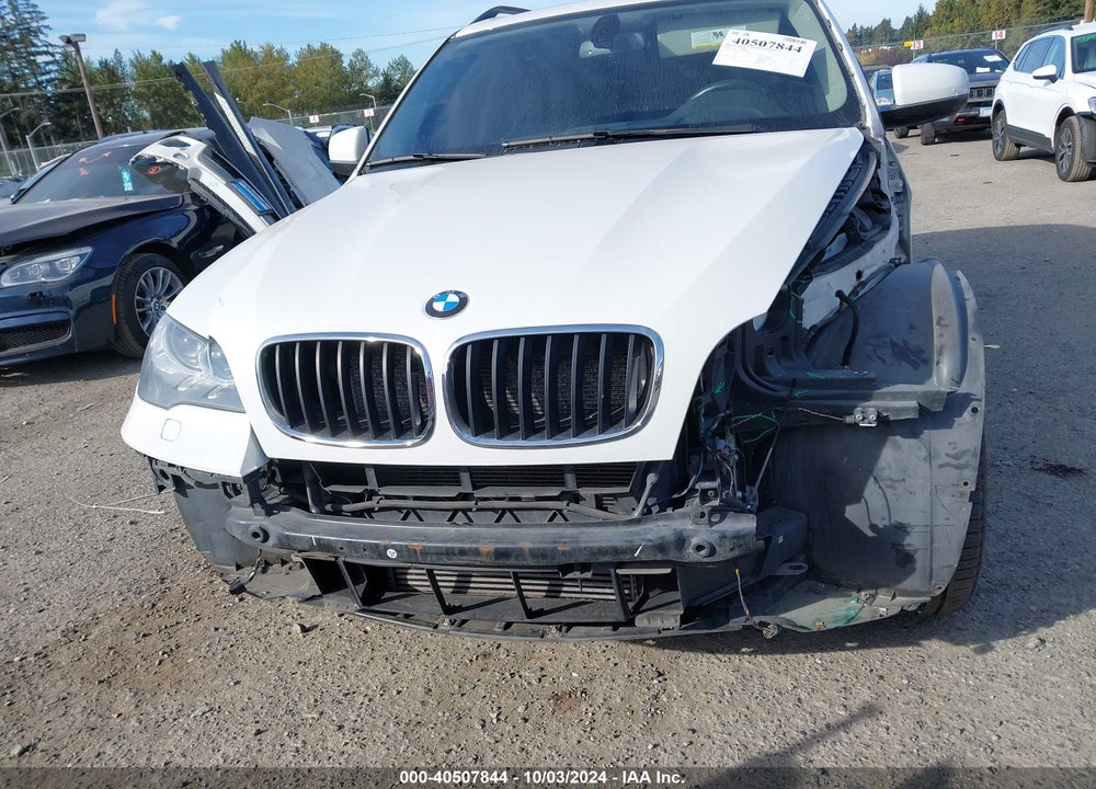 2012 BMW X5 XDRIVE35I/XDRIVE35I PREMIUM/XDRIVE35I SPORT ACTIVITY VIN: 5UXZV4C58CL990808
