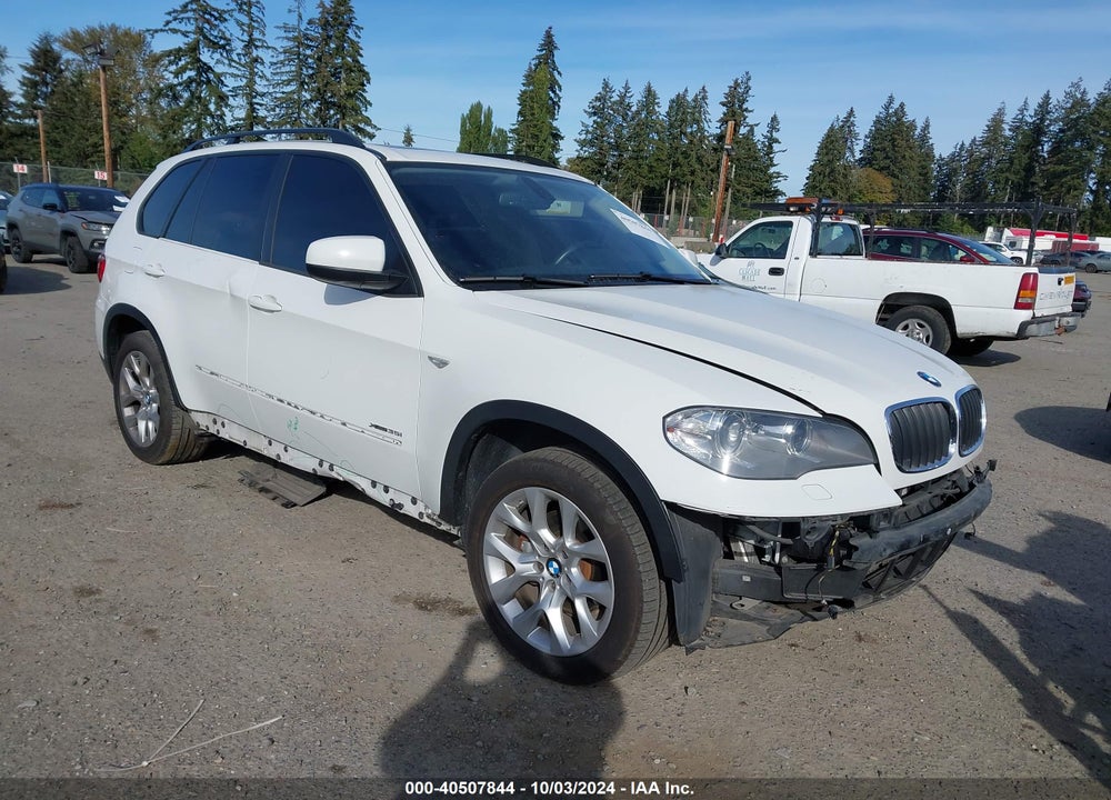 2012 BMW X5 XDRIVE35I/XDRIVE35I PREMIUM/XDRIVE35I SPORT ACTIVITY VIN: 5UXZV4C58CL990808