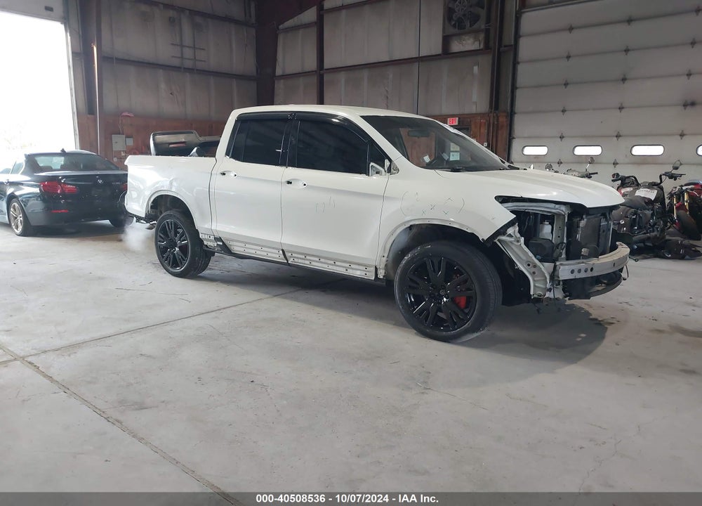 2017 HONDA RIDGELINE RTL VIN: 5FPYK3F58HB019367