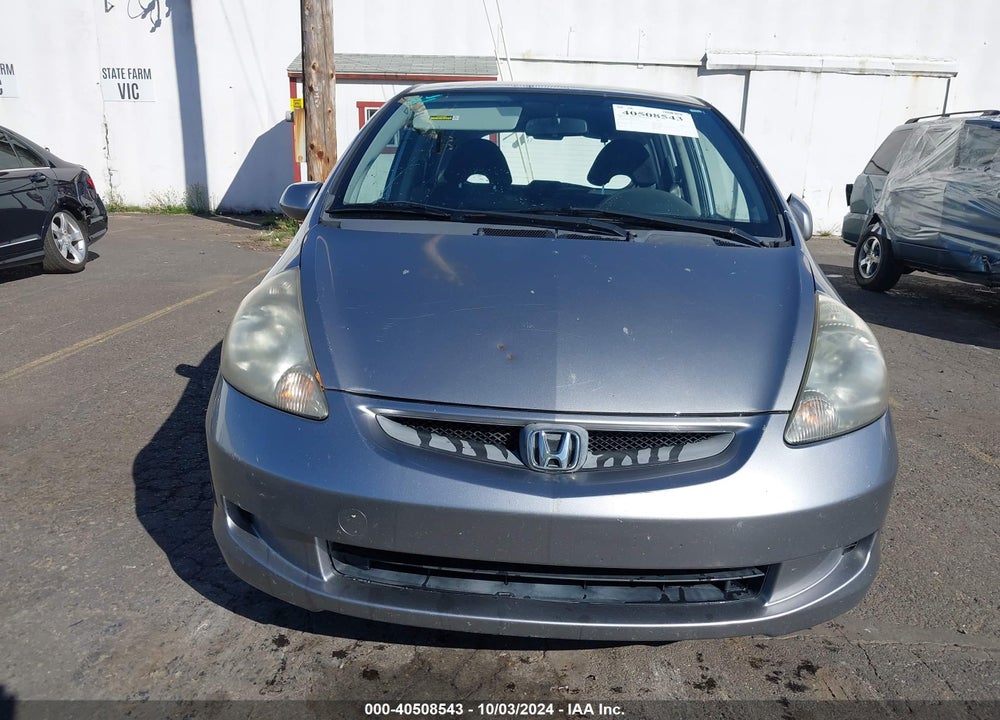 2007 HONDA FIT VIN: JHMGD38447S045452