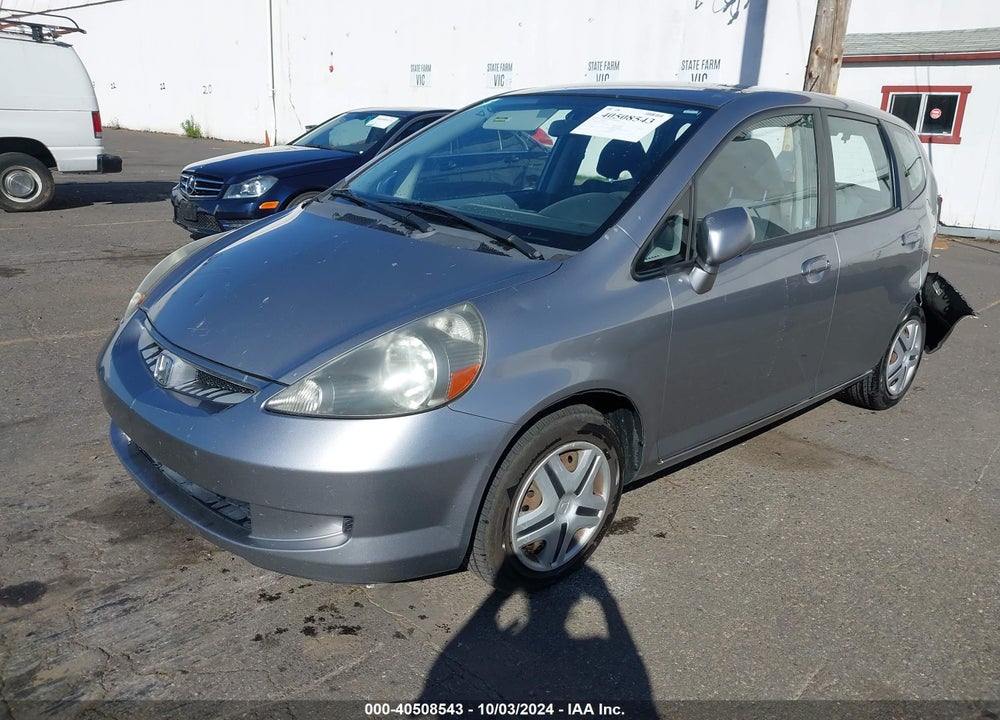 2007 HONDA FIT VIN: JHMGD38447S045452