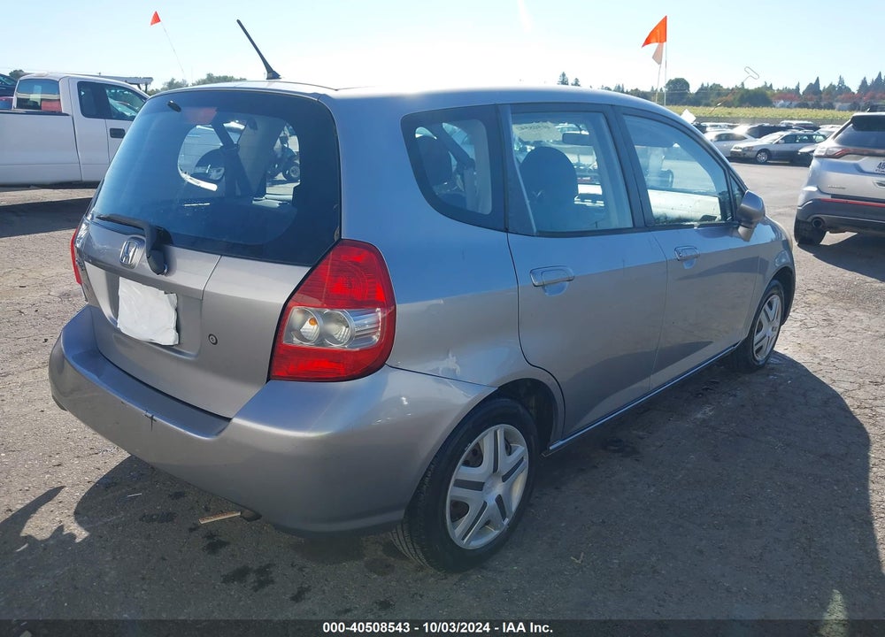 2007 HONDA FIT VIN: JHMGD38447S045452
