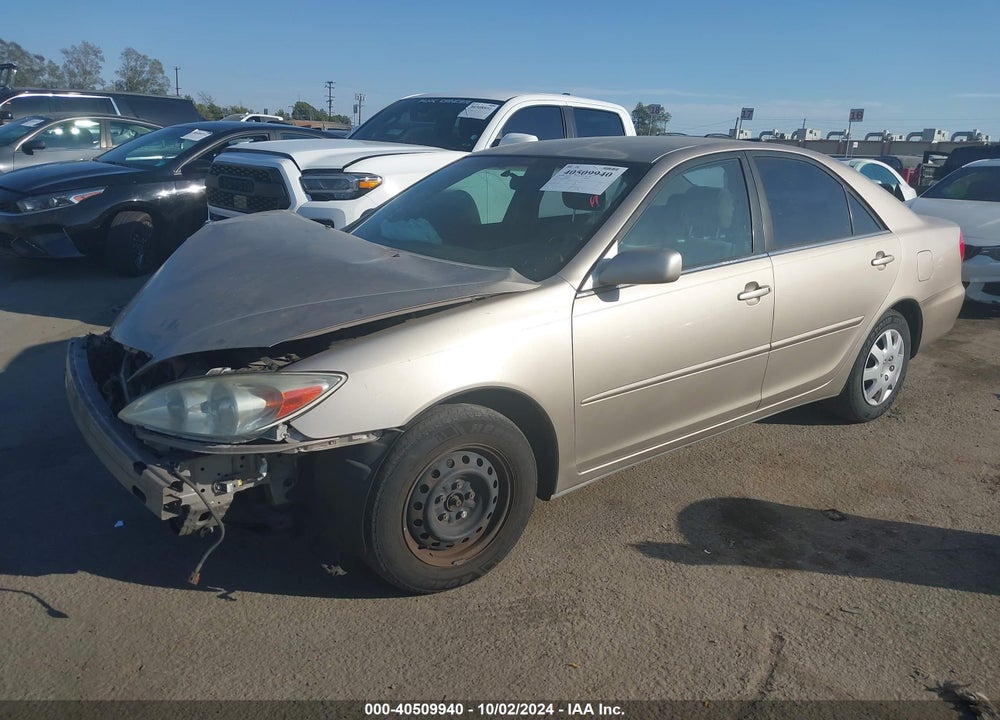 2002 TOYOTA CAMRY LE VIN: JTDBE32K920114060