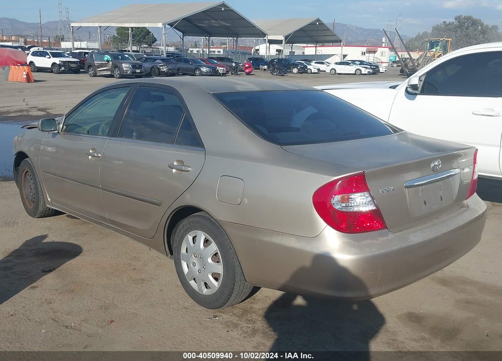 2002 TOYOTA CAMRY LE VIN: JTDBE32K920114060
