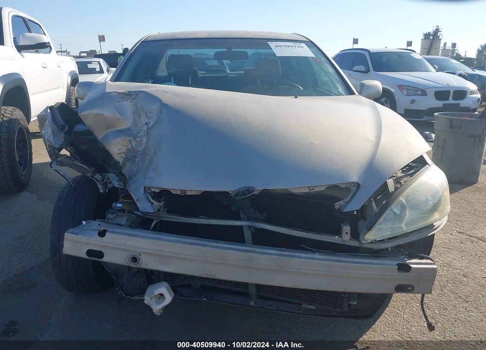 2002 TOYOTA CAMRY LE VIN: JTDBE32K920114060