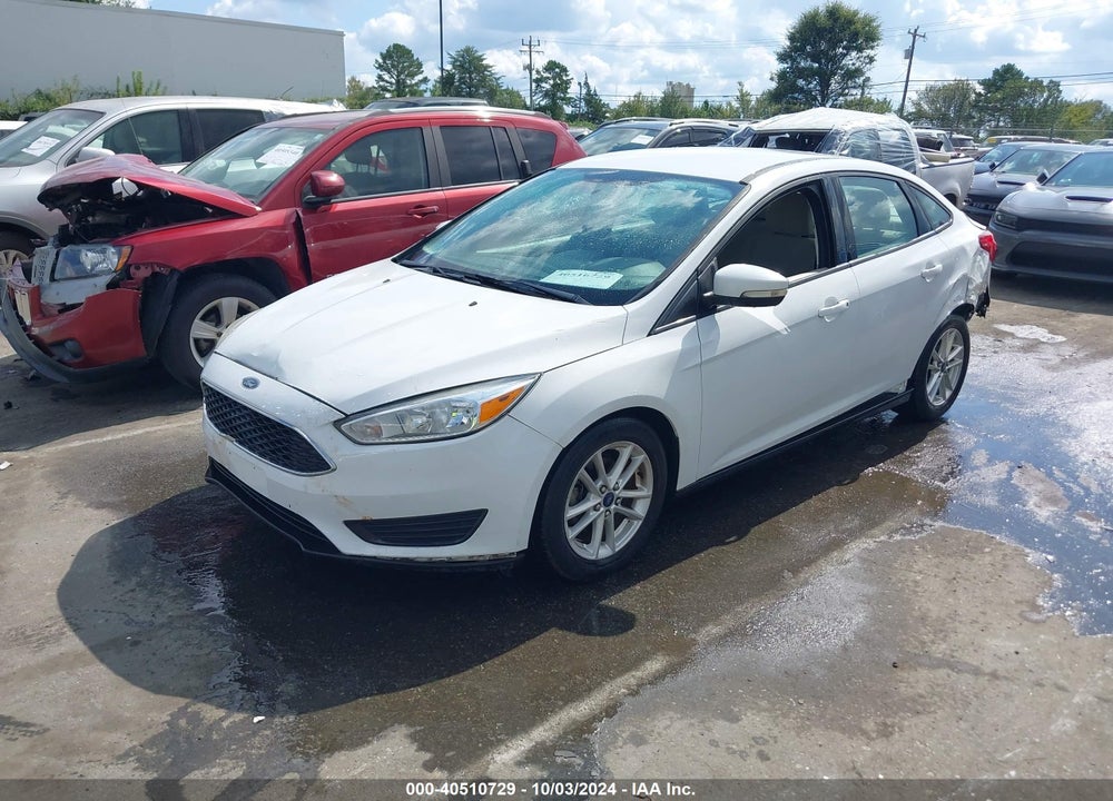 2016 FORD FOCUS SE VIN: 1FADP3F29GL272052