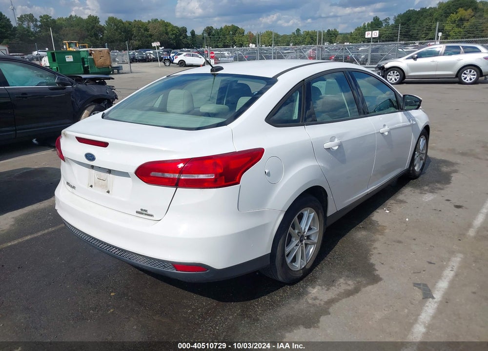 2016 FORD FOCUS SE VIN: 1FADP3F29GL272052