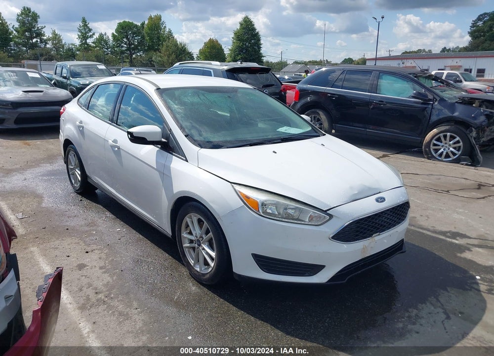 2016 FORD FOCUS SE VIN: 1FADP3F29GL272052