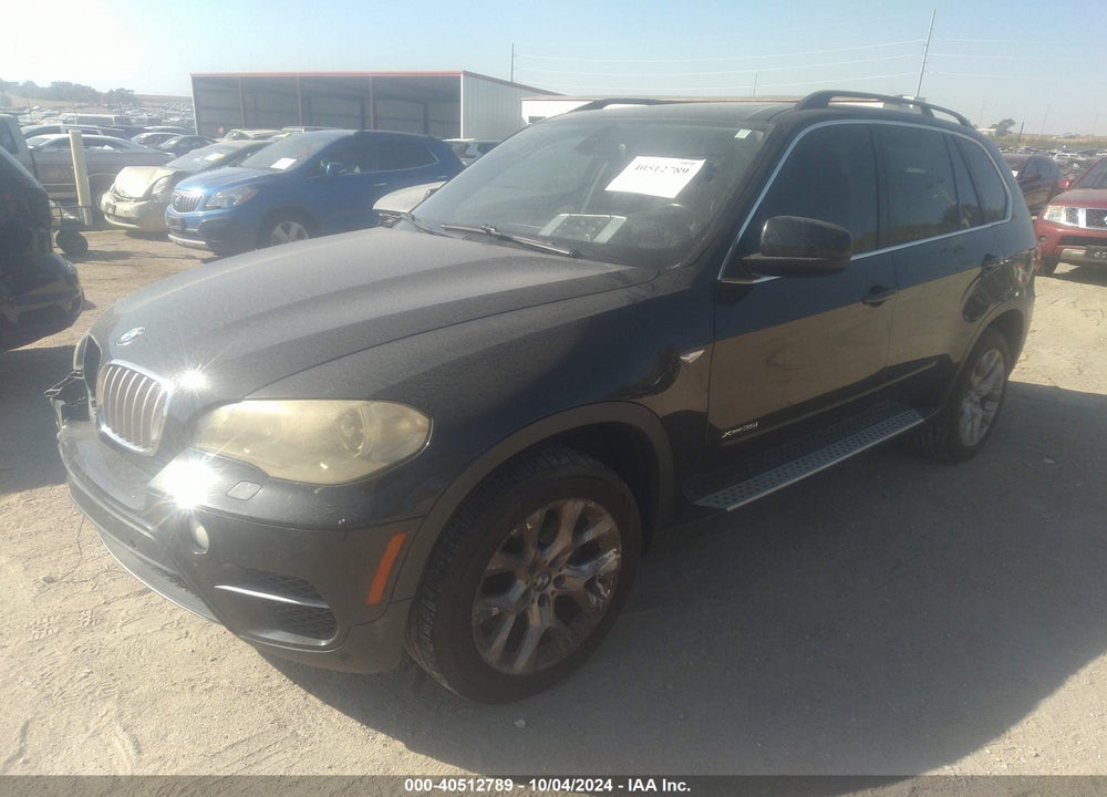 2013 BMW X5 XDRIVE35I/XDRIVE35I PREMIUM/XDRIVE35I SPORT ACTIVITY VIN: 5UXZV4C55D0E02532