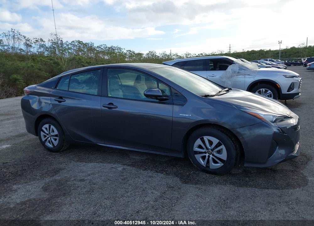 2018 TOYOTA PRIUS THREE VIN: JTDKARFU9J3067216