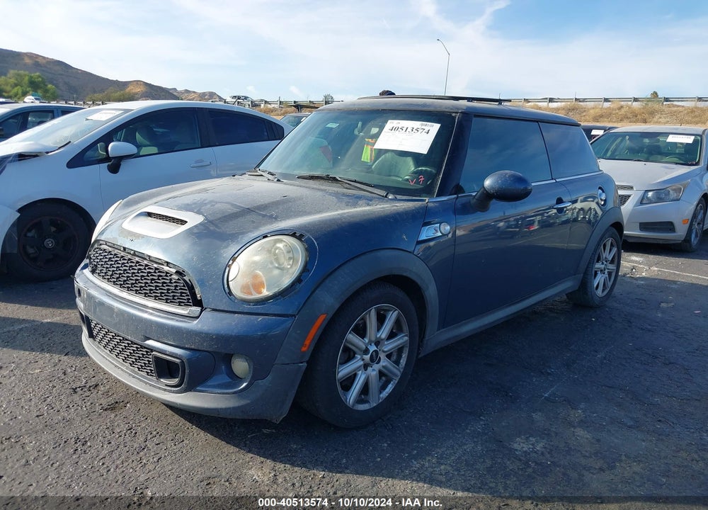 2011 MINI COOPER S VIN: WMWSV3C54BTY21006