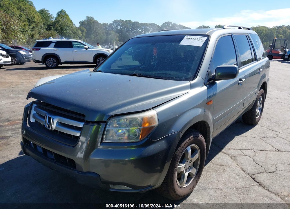 2007 HONDA PILOT EX-L VIN: 5FNYF18537B022397