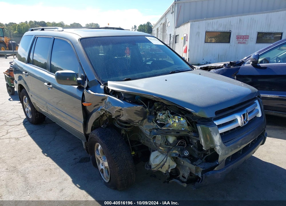 2007 HONDA PILOT EX-L VIN: 5FNYF18537B022397