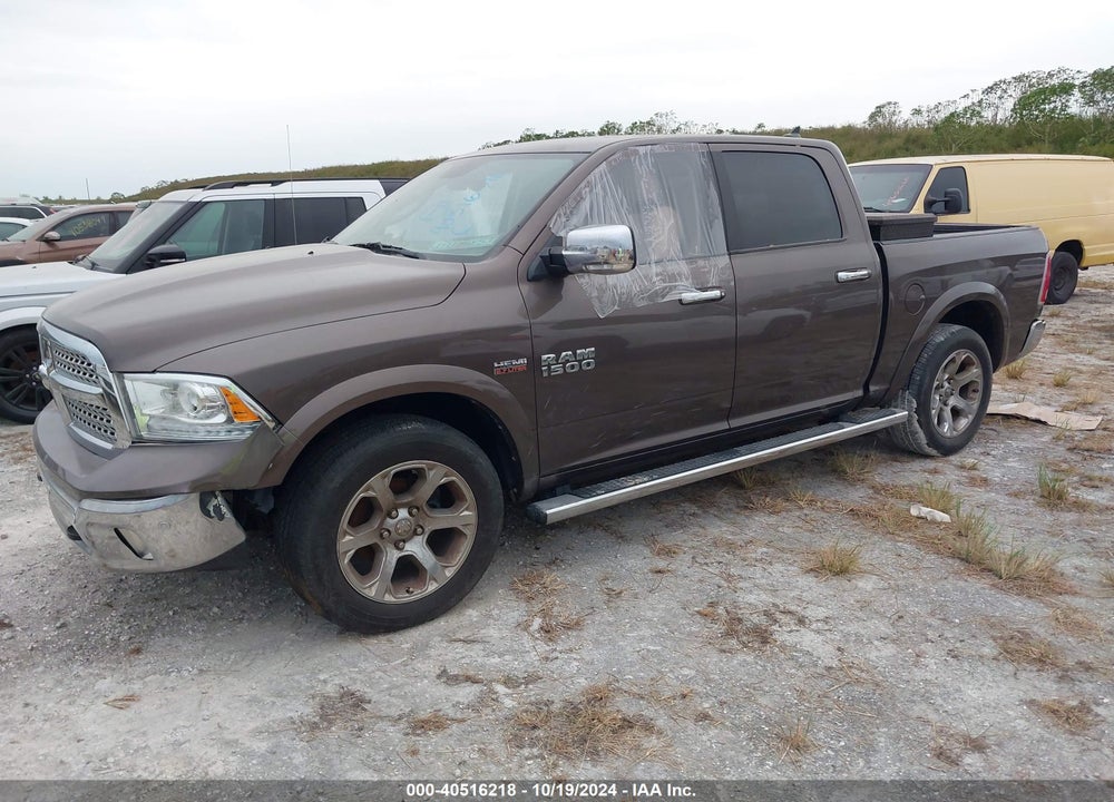 2018 RAM 1500 LAIE  4X4 5'7 BOX VIN: 1C6RR7NT1JS276256