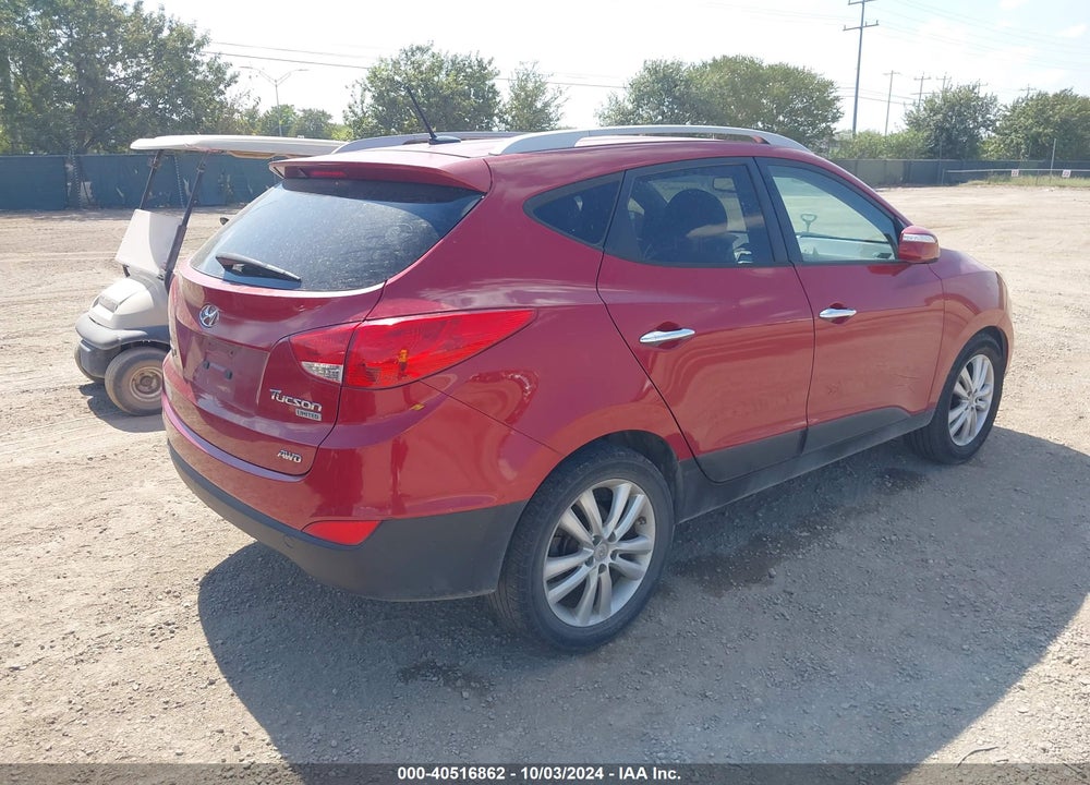 2012 HYUNDAI TUCSON LIMITED VIN: KM8JUCAC4CU404303