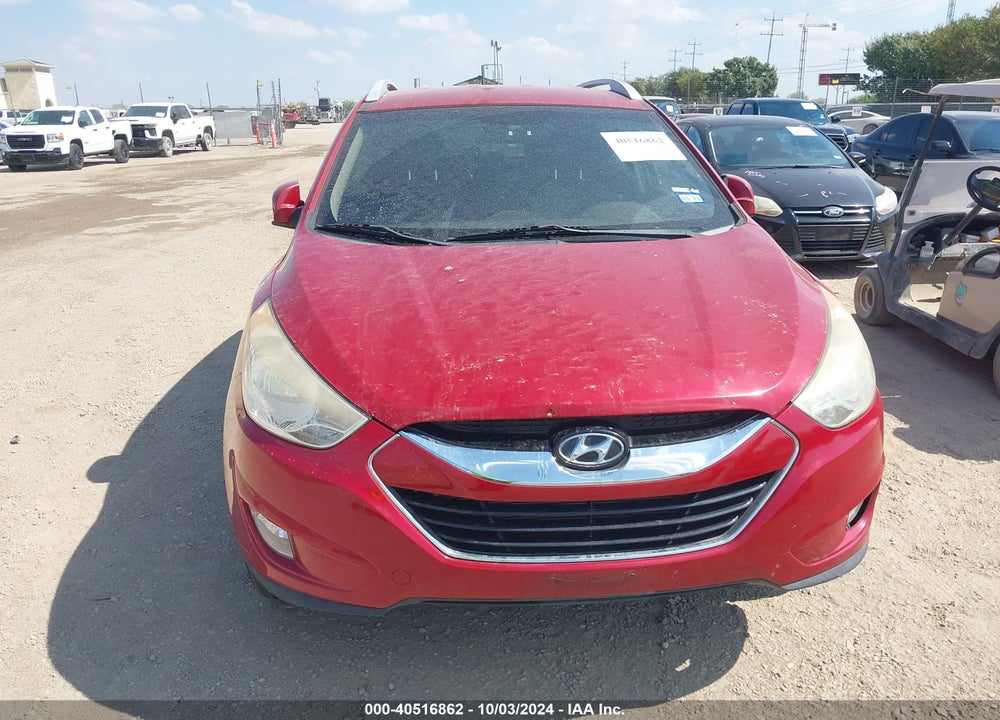 2012 HYUNDAI TUCSON LIMITED VIN: KM8JUCAC4CU404303